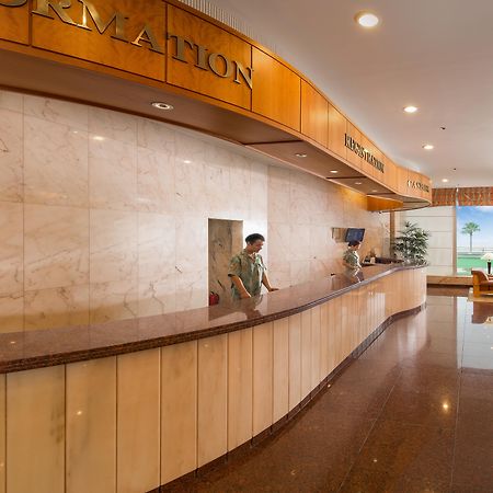 Seogwipo Kal Hotel Exterior foto Reception desk at a hotel